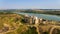 Aerial view of Khotyn medieval castle on the green hill above the river.