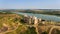 Aerial view of Khotyn medieval castle on the green hill above the river.