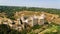 Aerial view of Khotyn medieval castle on the green hill above the river.