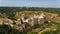 Aerial view of Khotyn medieval castle on the green hill above the river.