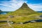 Aerial view of Kirkjufell mountain landscape and waterfalls below in Iceland