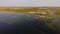 Aerial view of kite camping at coast of lake.