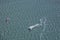 Aerial view of a kite surfer sporting on turquoise Sardinian waters