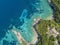 Aerial view of Klimatia Beach, close to Limni beach on the island of Corfu. Coastline. Boats and bathers. Greece