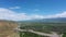 Aerial view on the Kura river and Caucasus mountains