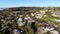 Aerial view of La Jolla little coastline city with wealthy villas and swimming pool.