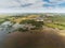 Aerial view on lake Corrib, county Galway, Ireland. Rural landscape. Cloudy sky. Green fields and old abandoned quarry