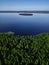 Aerial view of lake, islands, and forest.