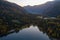 Aerial view of Lake Lago di Anterselva and autumn forest during sunset. Italian Alps