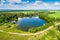 Aerial view of lake lake surrounded by trees