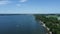 Aerial view of Lake Ontario and the green shoreline. Sandbanks Provincial Park, Picton, Canada.