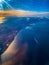 Aerial view of lake Ontario Toronto shoreline with golden blue skyline at sunset