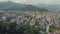 Aerial view of Lake Phewa, Lakeside, the boat pier and the hills covered with rainforest surrounding them. Pokhara