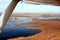 Aerial View of the Lake Powell with the house-boats marina and buttes on the shores