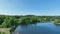 Aerial view lake road cars trees afternoon Tarrytown Lakes Park