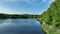 Aerial view lake road cars trees afternoon Tarrytown Lakes Park