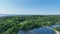 Aerial view lake road cars trees afternoon Tarrytown lakes park