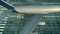 Aerial view of a landing airplane revealing flag of Bangladesh on the airfield of an airport. Air travel related