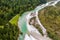 Aerial view of a landscape around a big river in a riverbed in mountain area,