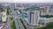 Aerial view of the landscape in a big city with high houses and skyscrapers in the center of Novosibirsk at a summer day.