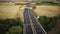 Aerial View of a Landscape Empty Highway, Zoom Out, Sun Light