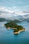 Aerial view landscape Karacaoren lake surrounded by mountains in Turkey. Forest island in turquoise water scenery wild nature