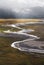 Aerial view landscape of river lines with foggy environment and sunlight in the morning, in Indonesia