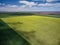 Aerial View of landscape with yellow rapeseed agricultural fields, springtime