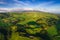 Aerial view of the landscapes on Sao Miguel Island, green farmland and volcanic mountains and lakes, Azores, Portugal