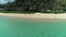 Aerial view of Lanikai beach, Honolulu, Hawaii, drone arc shot, people on the shore  , color graded