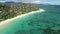 Aerial view of Lanikai beach, Honolulu, Hawaii, low angle view with drone camera moving forward, sunny day on the beach