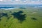 Aerial view of large forest area and distant lake Biale Augustowskie