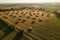 aerial view of a large hay bale maze in a sunny field