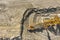 Aerial view of large heavy equipment machine mining natural resource. Coal mining by bucket wheel excavator. Heavy