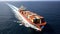 Aerial view of a large, heavy loaded container cargo ship