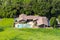 Aerial view of large house with pool surrounded by trees and green meadows, San Jose, Santa Clara county, south San Francisco bay