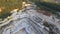 Aerial view of a large marble quarry during sunset