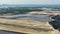 Aerial view of large open air phosphogypsum waste stack near Tampa, Florida. Potential danger of disposing byproduct of