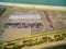 Aerial view of large parking lot with new imported cars in Port Melbourne, Australia.