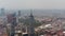 Aerial view of large town cityscape with Torre Latinoamericana tall building and Palacio de Bellas Artes. Orbiting