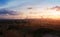 Aerial view of large wind turbines at sunset taken from the air. wind turbines farm park.