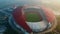 Aerial view - the largest stadium of Bekasi from drone. Indonesia. With smog pollution