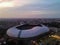 Aerial View of The largest stadium of Bekasi from drone when sunset and noise cloud. Bekasi, Indonesia, March 21, 2021