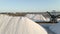 Aerial View Of Las Salinas de Torrevieja, Salt Production Industry In Alicante, Spain. drone pullback