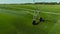 Aerial view of lawn field and irrigation sprinkler