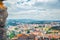 Aerial view of Leiria city residential districts and green hills background, Beira Litoral province