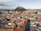 Aerial view of Leiria with red roofs and castle on the hill, Portugal