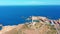 Aerial view. Lighthouse on island, Spain meditterian sea.