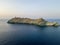 Aerial view of the Lighthouse and Tower on the island of Giraglia. Cap Corse peninsula. Corsica. France