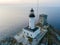 Aerial view of the Lighthouse and Tower on the island of Giraglia. Cap Corse peninsula. Corsica. France